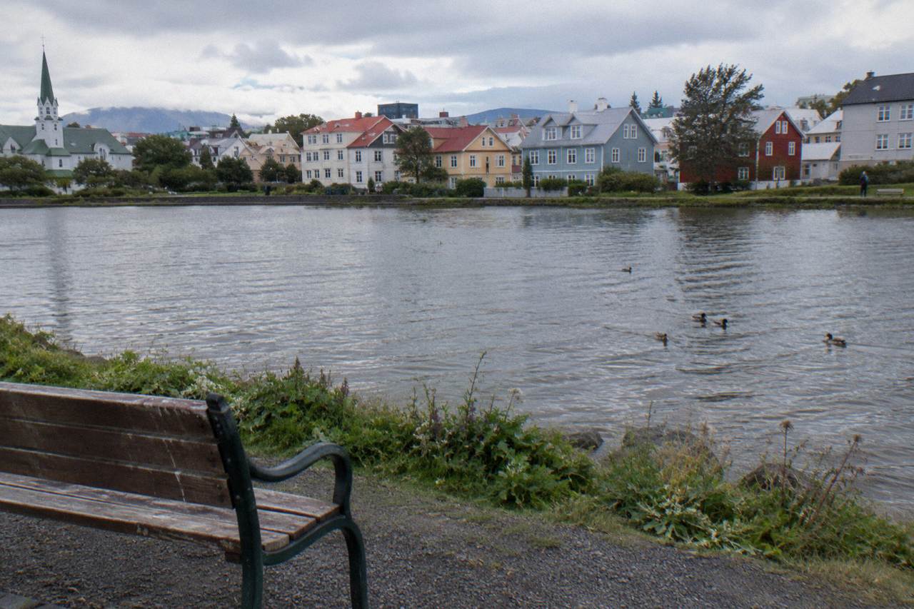 Colourful steel-clad houses along a quiet Reykjavik street on an overcast morning