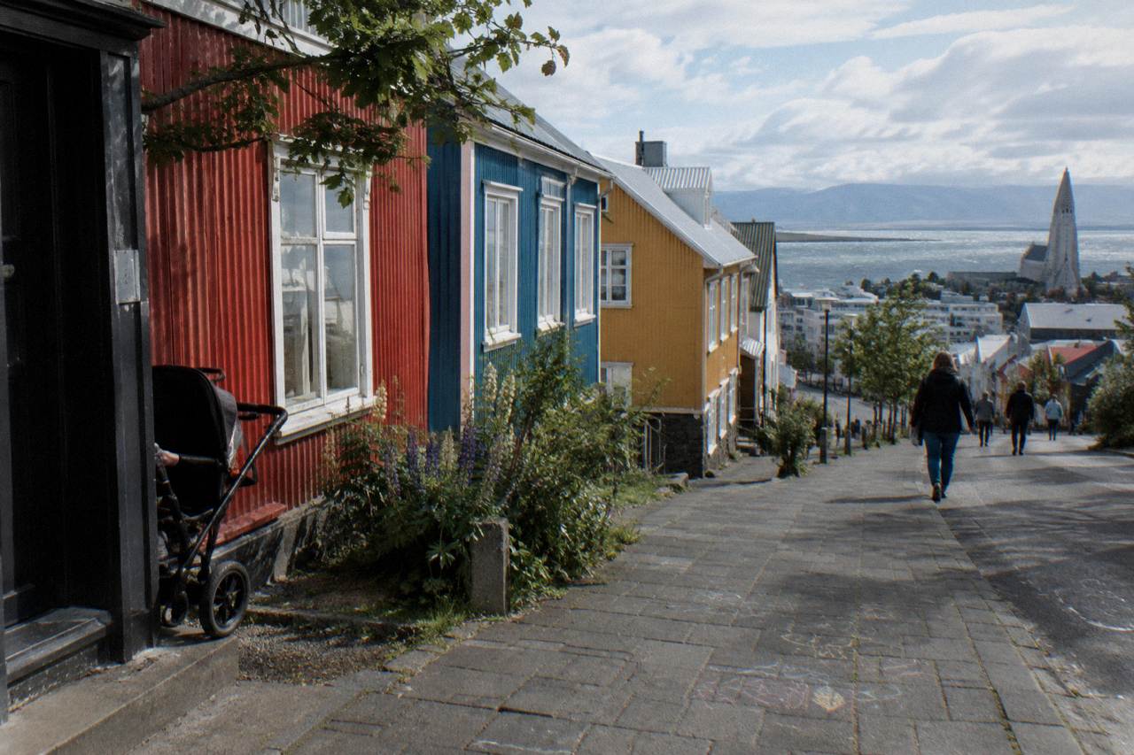Colourful houses along a quiet pedestrian street in central Reykjavik on a bright morning