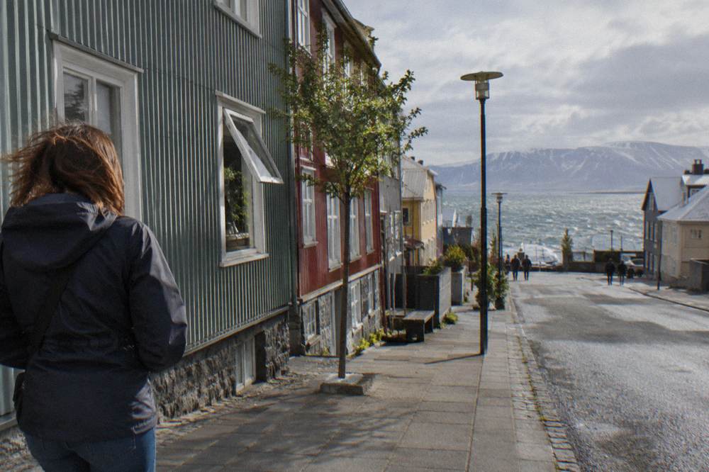 Casual trousers and a rain jacket on a dry morning in central Reykjavik