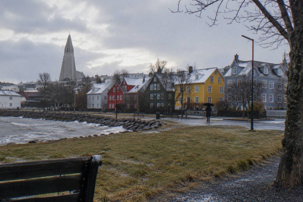 Row of brightly painted tin houses on a residential street in central Reykjavik